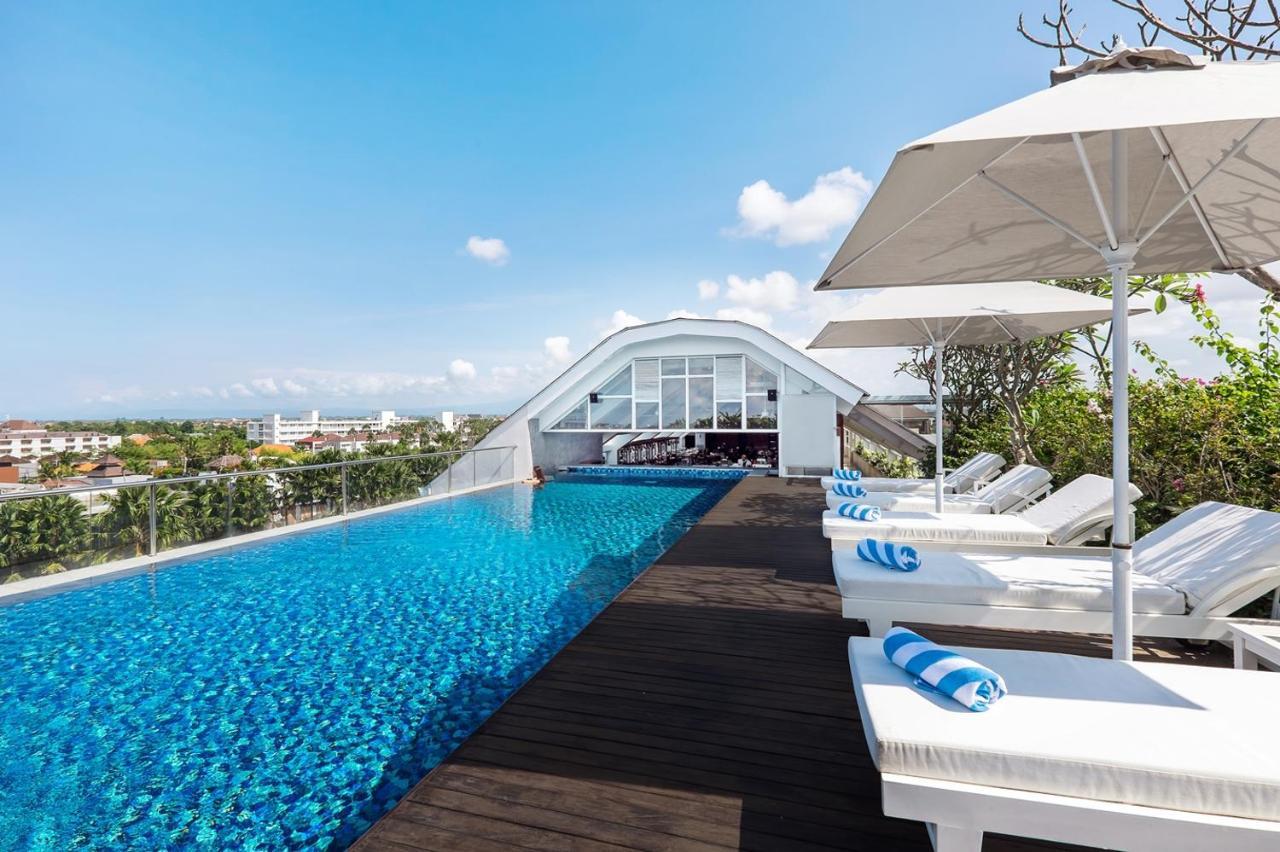 Jambuluwuk Oceano Seminyak Hotel Exterior photo Rooftop pool at the hotel